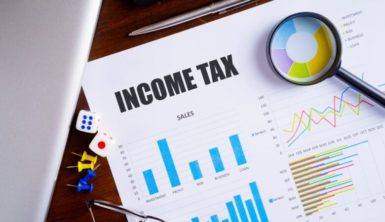 Income tax rise helps cut deficit on UK public finances 1